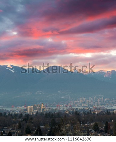 Sunset sky over city port of Vancouver BC British Columbia Canda
