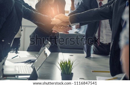Business people putting their hands together. Hand  ,Unity ,success and teamwork concept. Royalty-Free Stock Photo #1116847541