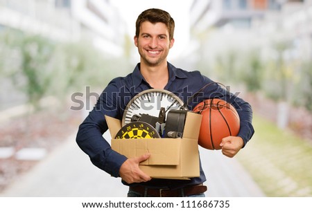 Man Holding Box And Basketball, Outdoor