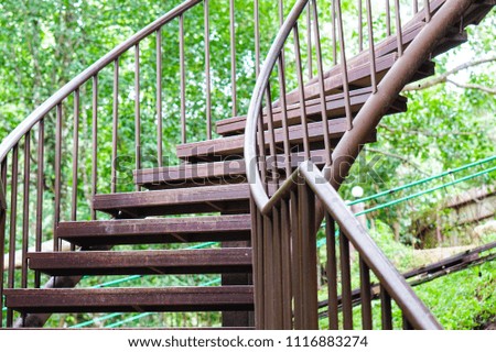 Old wooden stairs in curved corners