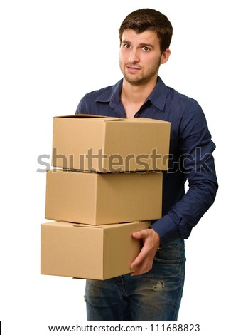 A Young Man Holding A Stack Of Cardboard Boxes On White Background