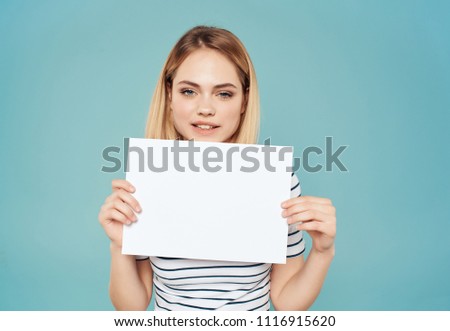 woman holding a clean sheet of paper                       