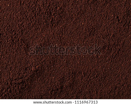 Instant coffee background and texture, top view, pile of powdered  