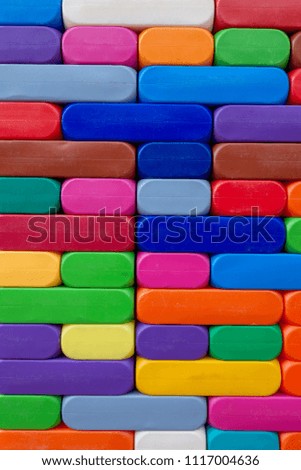 Abstract Background. Background with different colorful shapes plastic blocks . Geometric shapes in different colors.