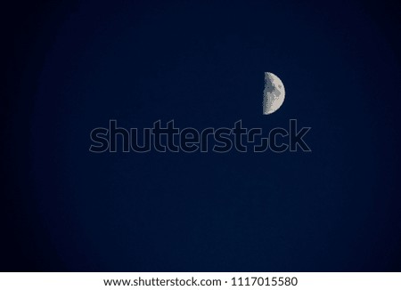Half moon in the blue night sky, night sky landscape