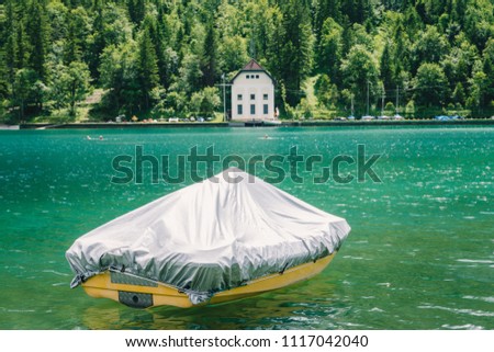 Marina and boat house, Lake Plansee near Reutte, Austrian Alps. Austria.