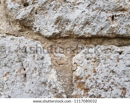 Very old stone wall in church