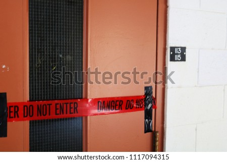 Danger Do Not Enter Tape On Door