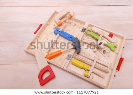 A suitcase with coloured toy instruments