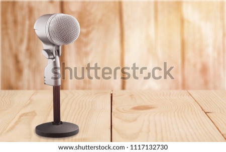 Retro style microphone recorder on desk