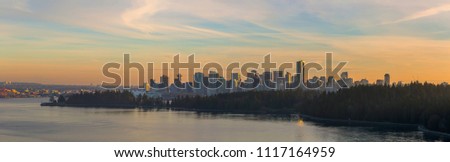 Vancouver British Columbia Canada  downtown city skyline by Stanley Park during sunset panorama