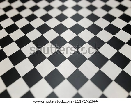 Pattern of back and white ceramic tiles.