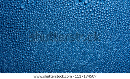 Water drops with blue background