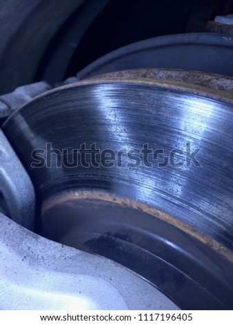brake disk rotor shiny, caliper, rust