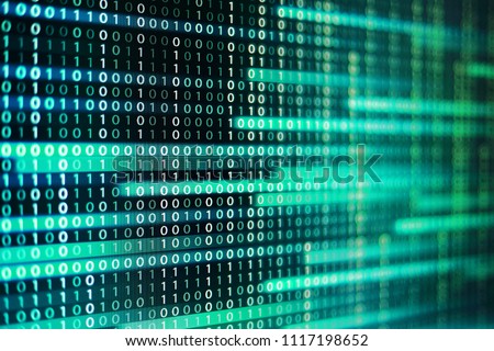 power of big data. binary code information bit on computer monitor screen display. green light text number one and zero. blur defocus blue bokeh light. technology graphic design background concepts