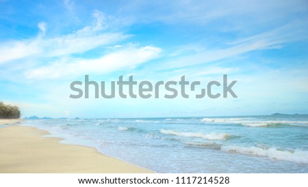white sand beach meet tropical ocean with small waves and nice blue sky in Summer at Huai Yang, Thailand Royalty-Free Stock Photo #1117214528