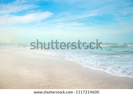 white sand beach meet tropical ocean with small waves and nice blue sky in Summer at Huai Yang, Thailand Royalty-Free Stock Photo #1117214600