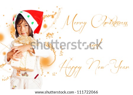 Happy little girl with Christmas gift isolated on white background with area for your text