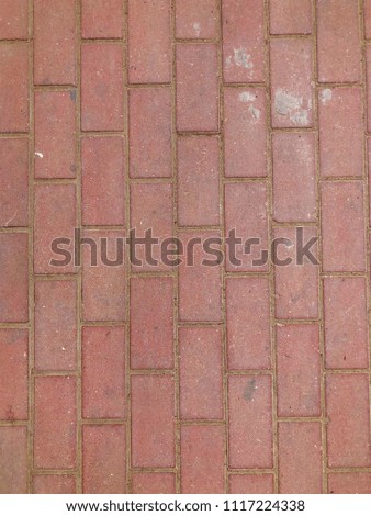 Red bricks paving stones for side walk, background