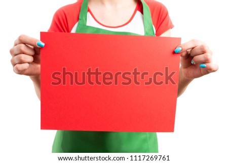 Close-up of female retail sales worker hands holding empty paper as blank copy space advertising area concept isolated on white background