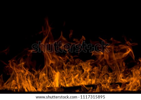 Abstract fireplace fire flames on black background
