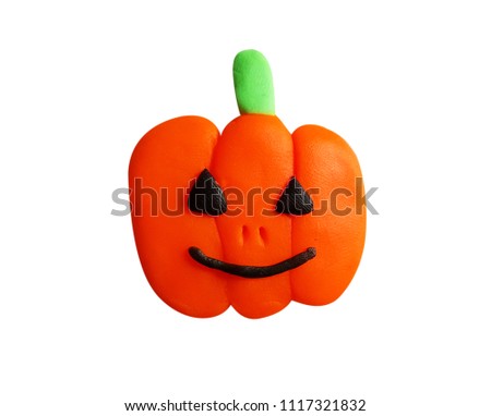 Plasticine Halloween pumpkin isolated on a white background. Clipping path.