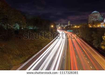 Interstate freeway through downtown Portland Oregon during evening rush hour traffic