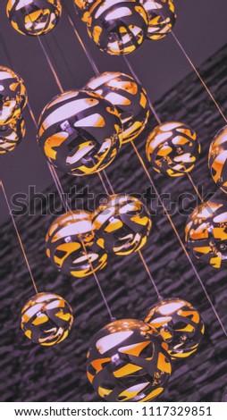 Portrait of some Light Balls hanging from the ceiling. A good patterned picture for backgrounds and wallpapers.