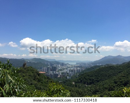 Looking down to the beautiful cityscape of Shatin, New Territories, Hong Kong from famous Amah Rock