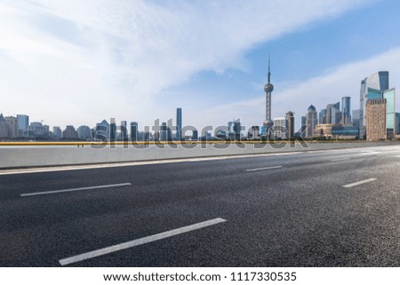 Panoramic skyline and buildings with empty road，shanghai city，china