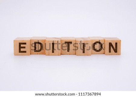 Edition Word Written In Wooden Cube