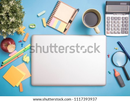 Computer Notebook Laptop on desktop and school stationery for Mockup Copyspace Design Advertising Background.