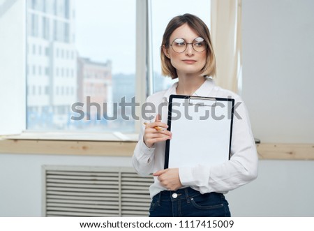 business woman with documents in the office of a career                              