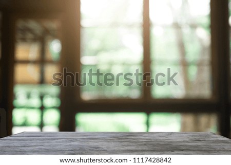 Empty space,wood table,Interior home blurred background at light bokeh.