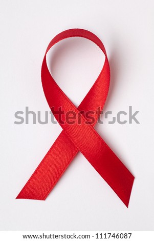 Red ribbon aids awareness Royalty-Free Stock Photo #111746087