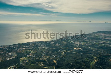 Panoramic of Marbella from la Concha Mountain with Marroco and sea mist