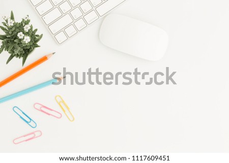 Flat lay photo of office desk with mouse and keyboard White copy space with pencil top view