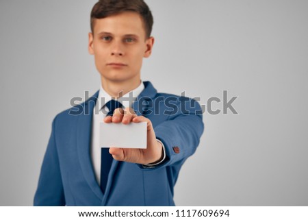 badge in hand, business man                              