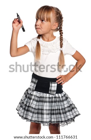 Happy little girl in school uniform with marker isolated on white background
