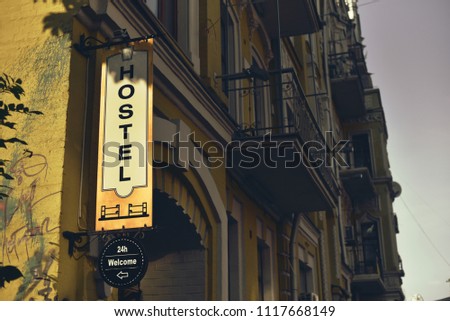 signboard of Hostel on old house