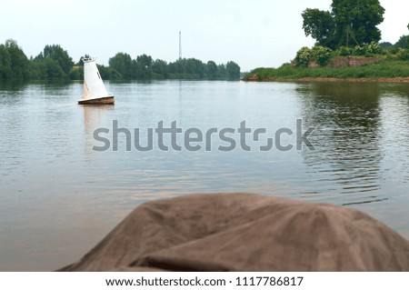buoy float in the river, the border of the channel on the river