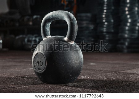Crossfit kettlebell training in gym