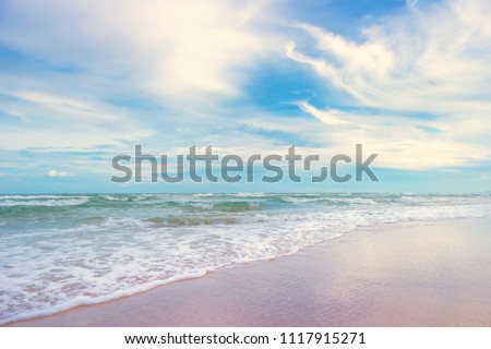 white sand beach meet tropical ocean with small waves and nice blue sky in Summer at Huai Yang, Thailand Royalty-Free Stock Photo #1117915271