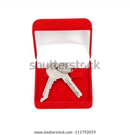 keys in red gift box isolated on a white