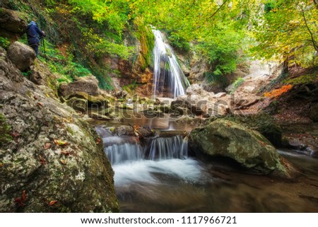 Djur-djur waterfall is located on the Ulu-Uzen river in the Crimea. Photographer takes pictures of landscapes. Spring rill flow. Nature composition.