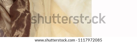 Silk fabric texture, background. Brown and cream stripes