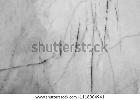 white marble pattern in the background.