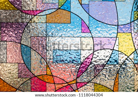 stained colorful christ glass . abstract multicolor  Royalty-Free Stock Photo #1118044304