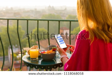 Woman using instant messaging app on phone Royalty-Free Stock Photo #1118068058