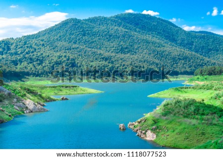 River and blue sky cloud mountain view. Landscape background. Forest wallpaper. 